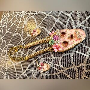 Betsey Johnson pink skull set.